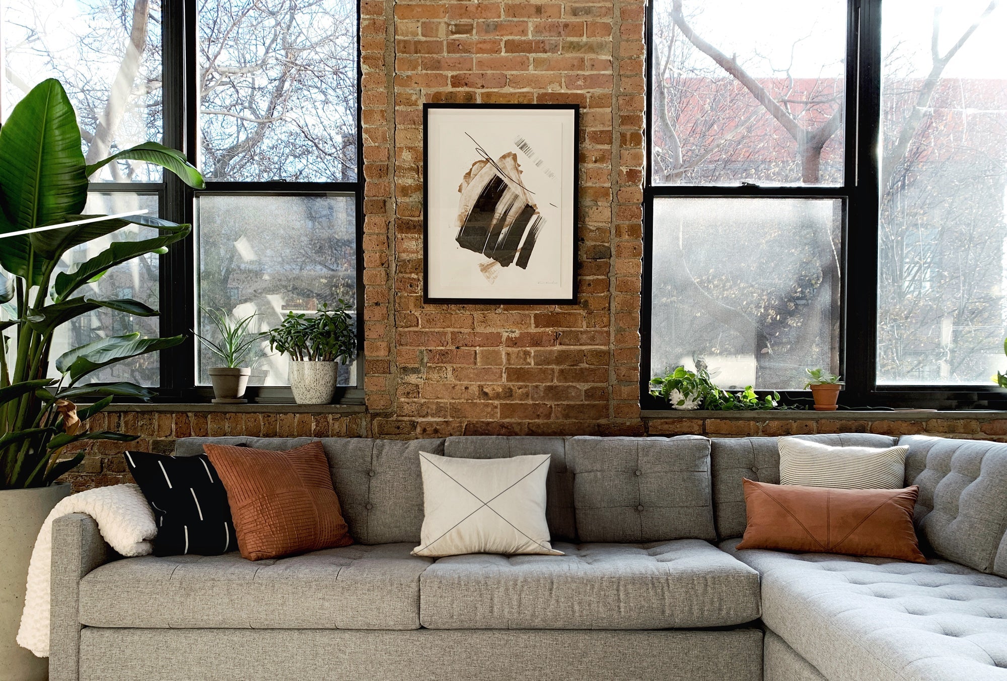 Hanging Art on a Brick Wall